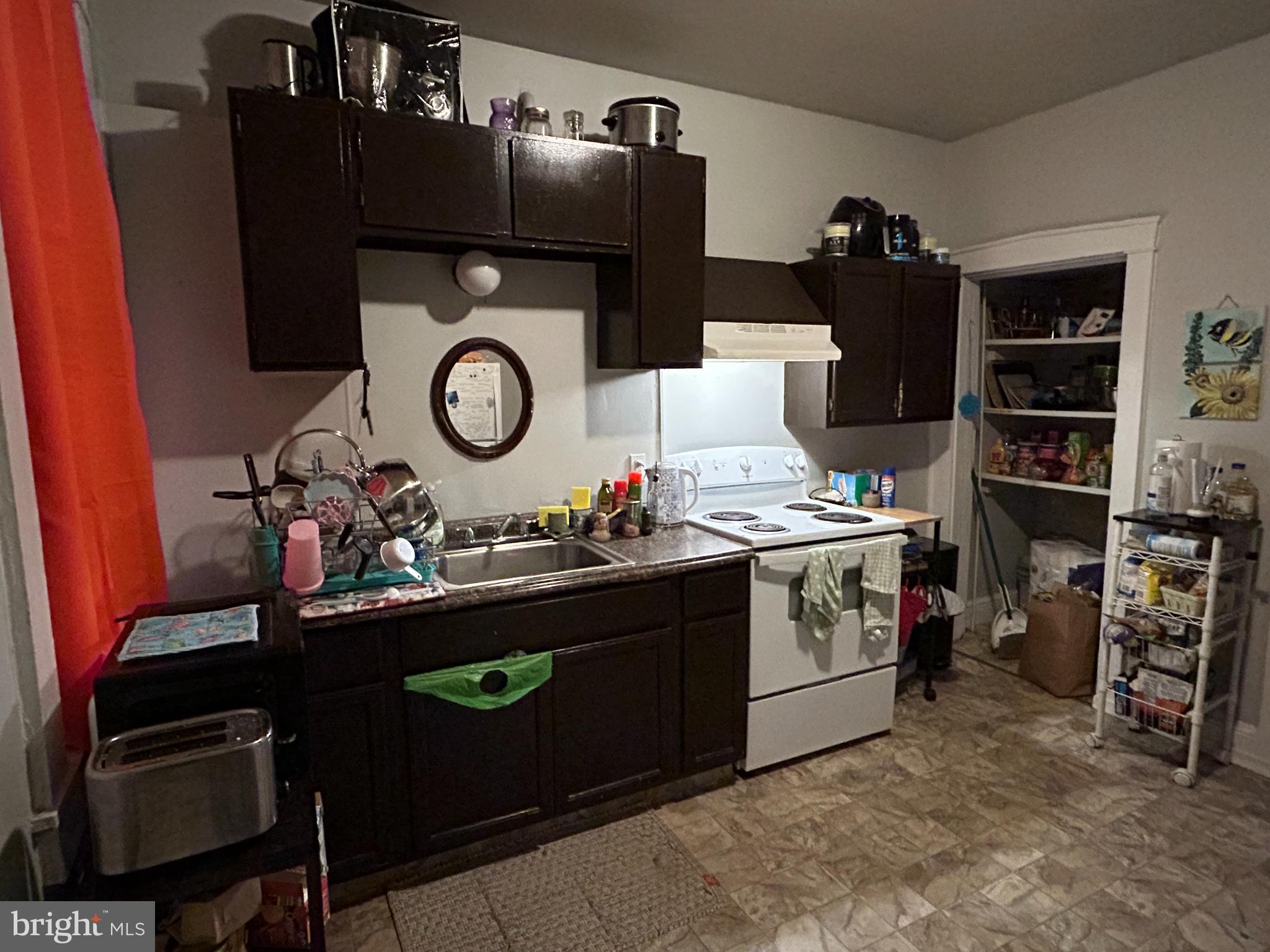 432 South Queen Street Lancaster, PA 17603 - Photo 5 of 19 Cozy kitchen with modern essentials.