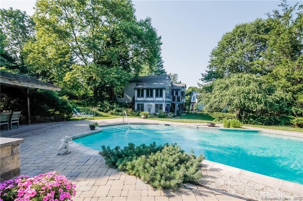 9 Forest Road Weston, CT 06883 - Photo 1 of 1 a view of swimming pool with lawn chairs and plants