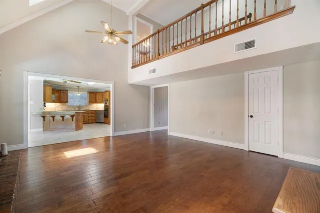 a view interior of a house an entryway and wooden floor