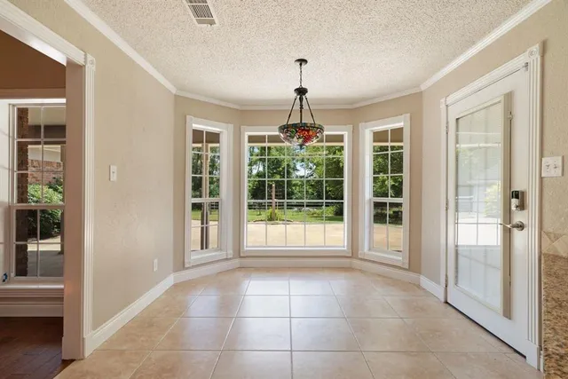 a view of an entryway with front door