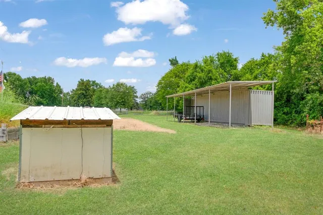 a house view with a garden space