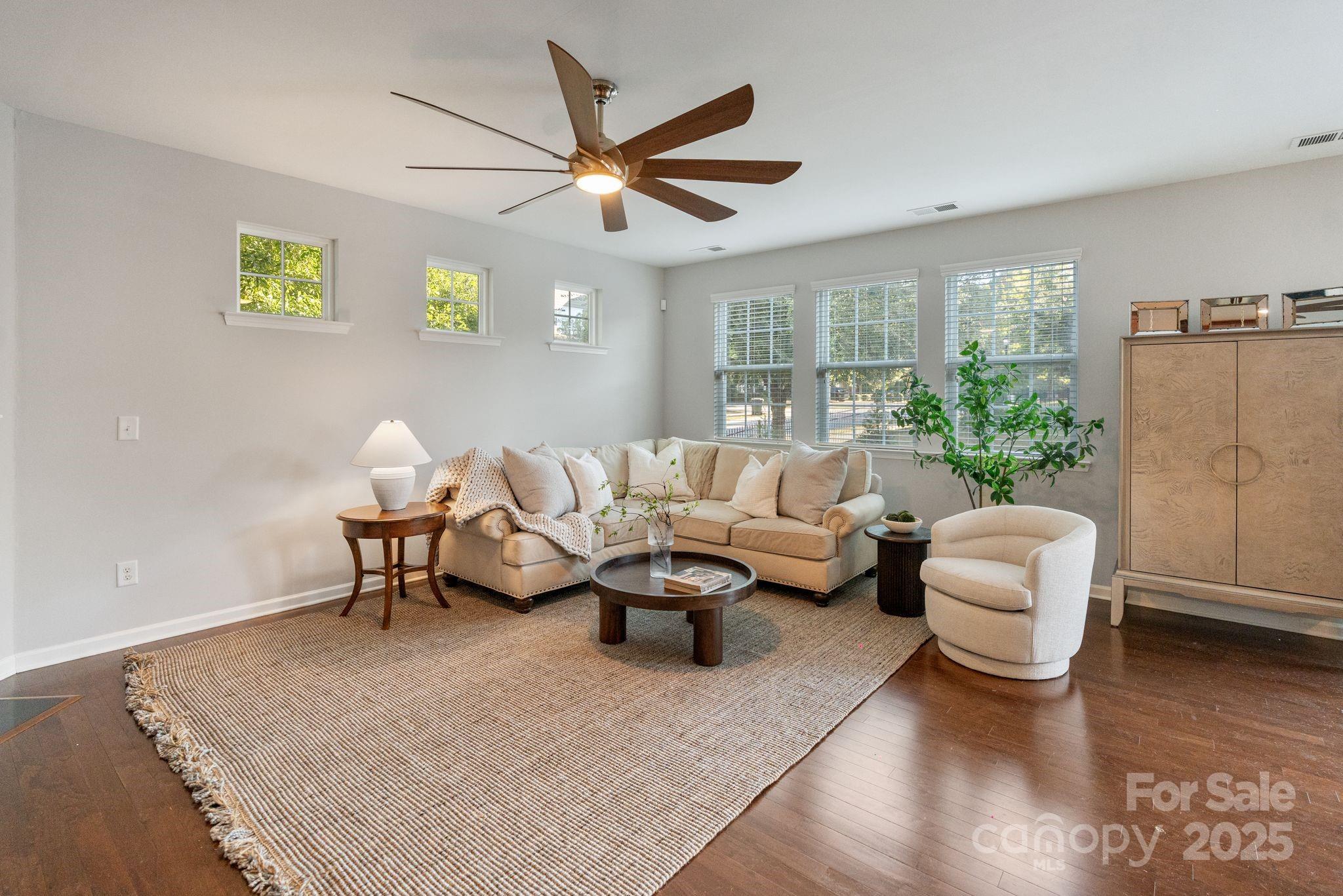 2005 Brightflower Lane York, SC 29745 - Photo 12 of 48 a living room with patio furniture and a large window