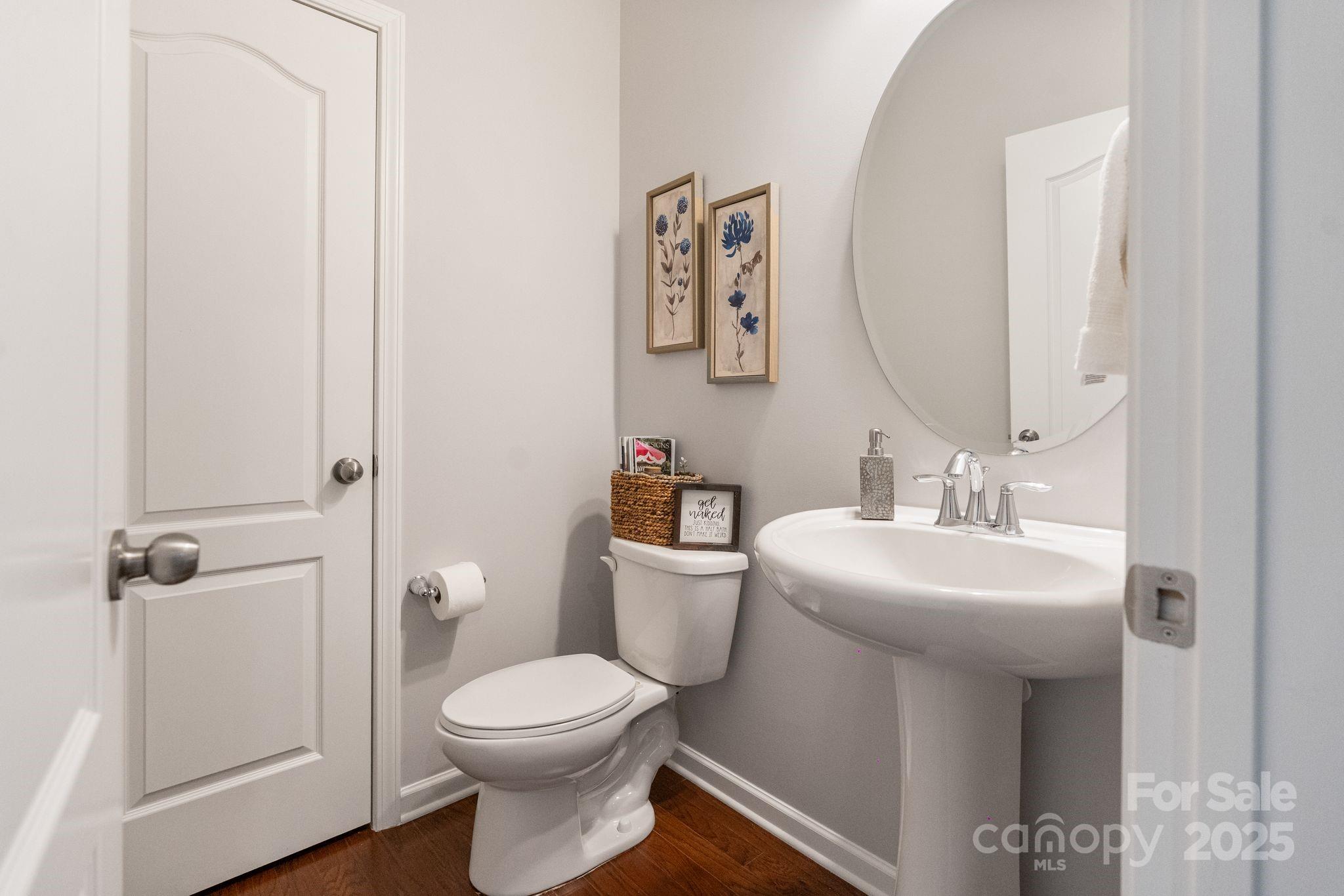 2005 Brightflower Lane York, SC 29745 - Photo 23 of 48 a bathroom with a sink mirror and toilet
