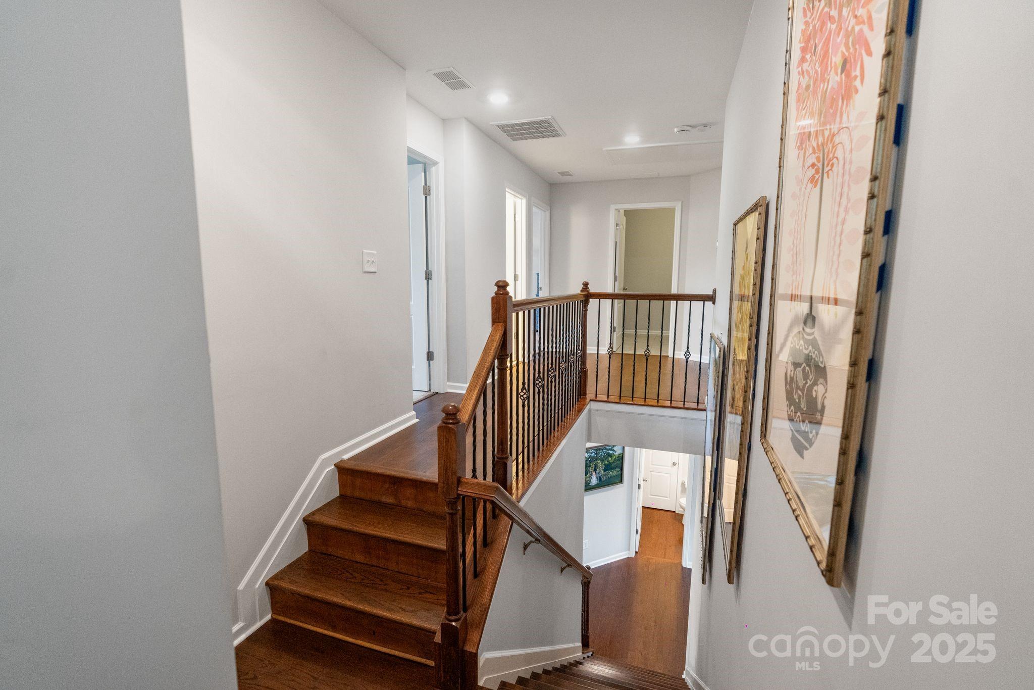 2005 Brightflower Lane York, SC 29745 - Photo 25 of 48 a view of entryway with wooden floor and stairs