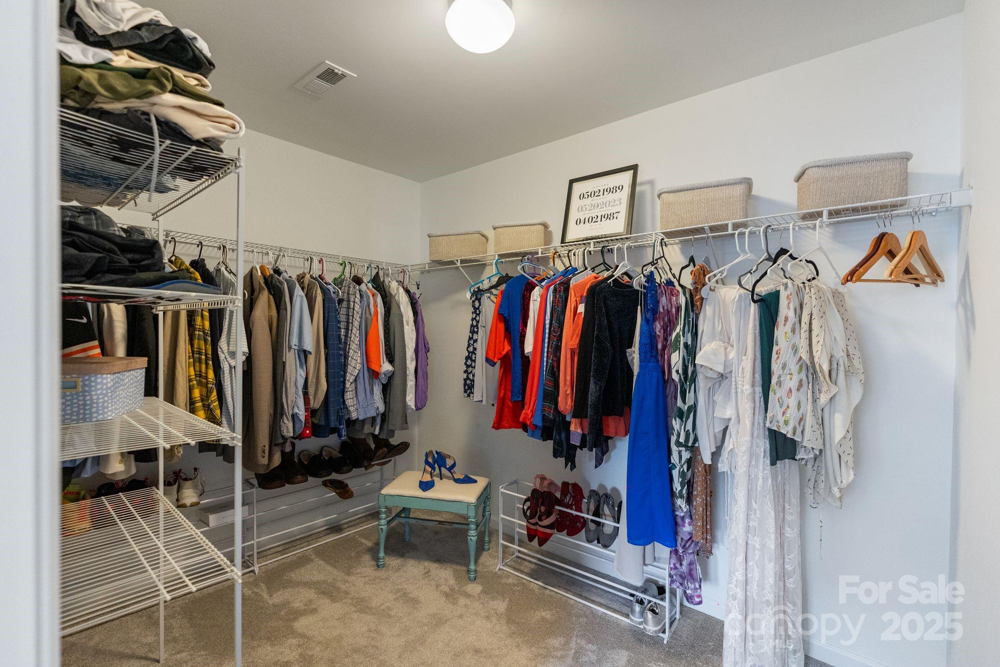 2005 Brightflower Lane York, SC 29745 - Photo 31 of 48 a view of walk in closet with clothes and shoes