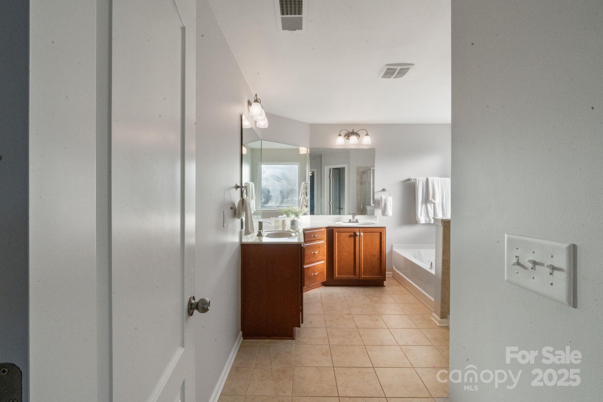 2005 Brightflower Lane York, SC 29745 - Photo 32 of 48 a view of kitchen with stainless steel appliances refrigerator sink and stove