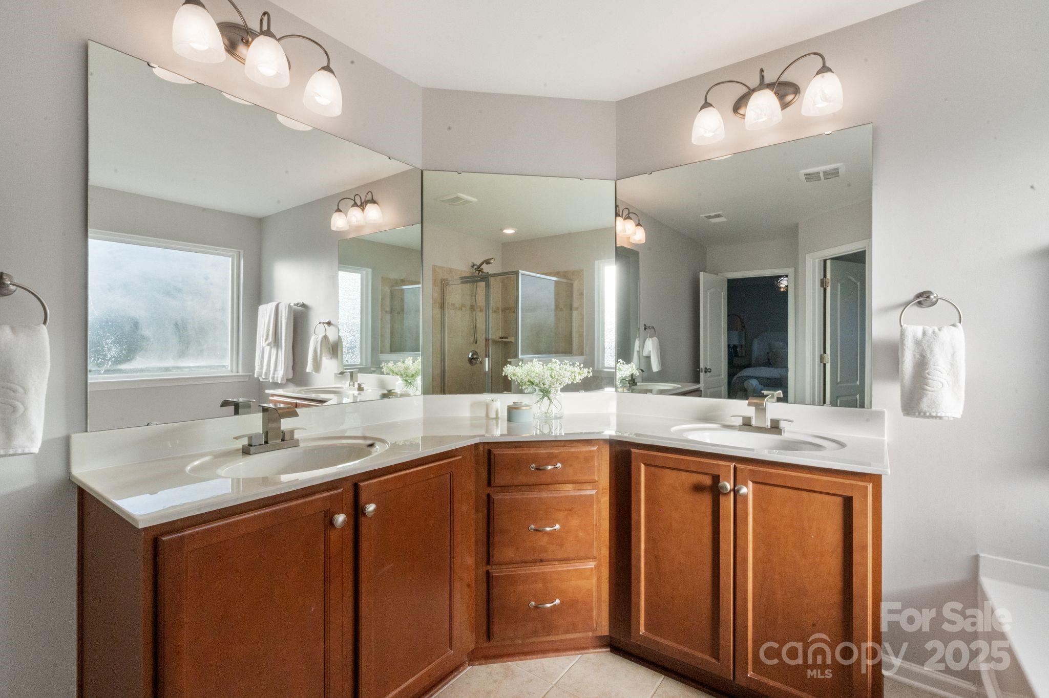 2005 Brightflower Lane York, SC 29745 - Photo 33 of 48 a bathroom with a sink and mirror
