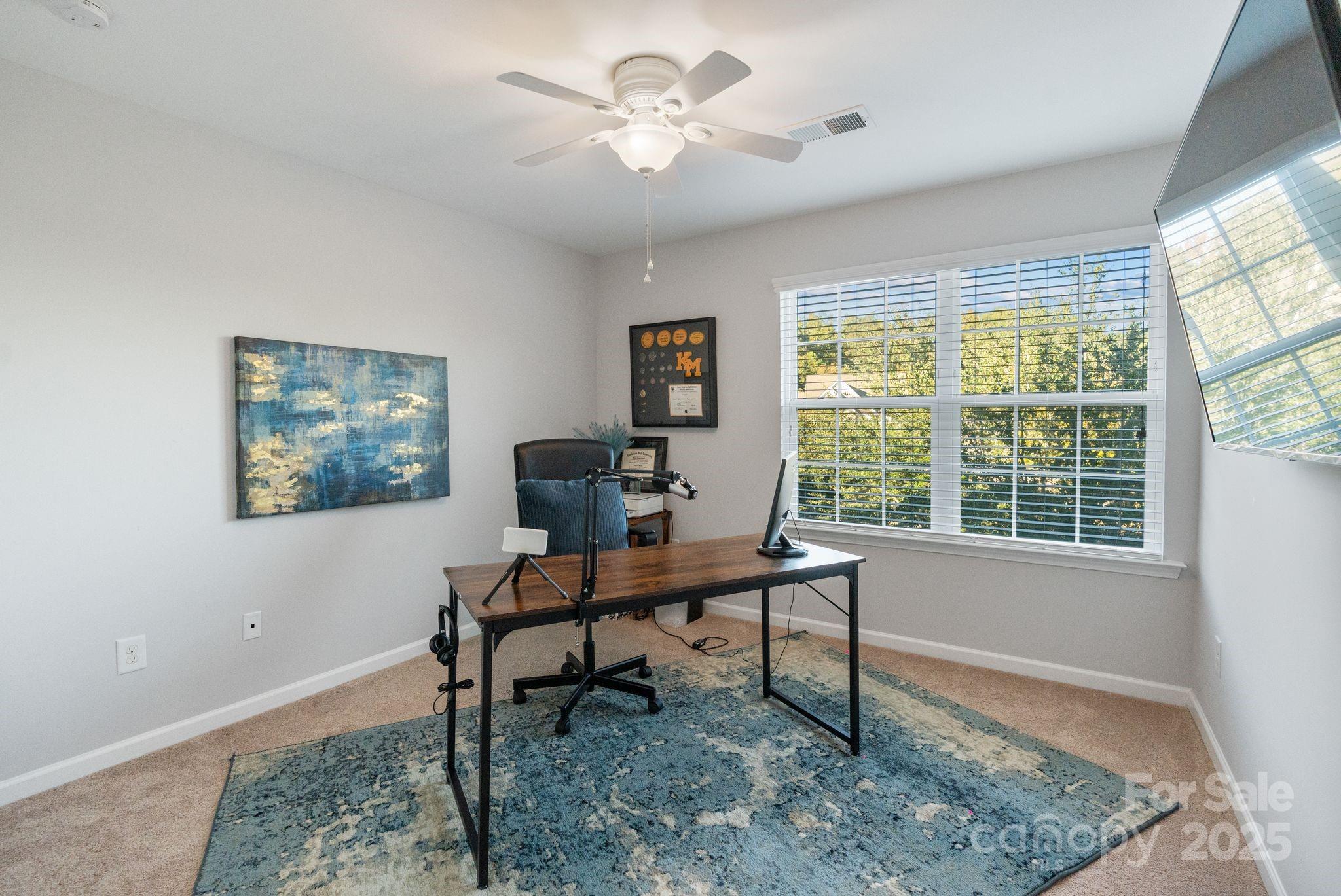 2005 Brightflower Lane York, SC 29745 - Photo 36 of 48 a view of a workspace with furniture and a window