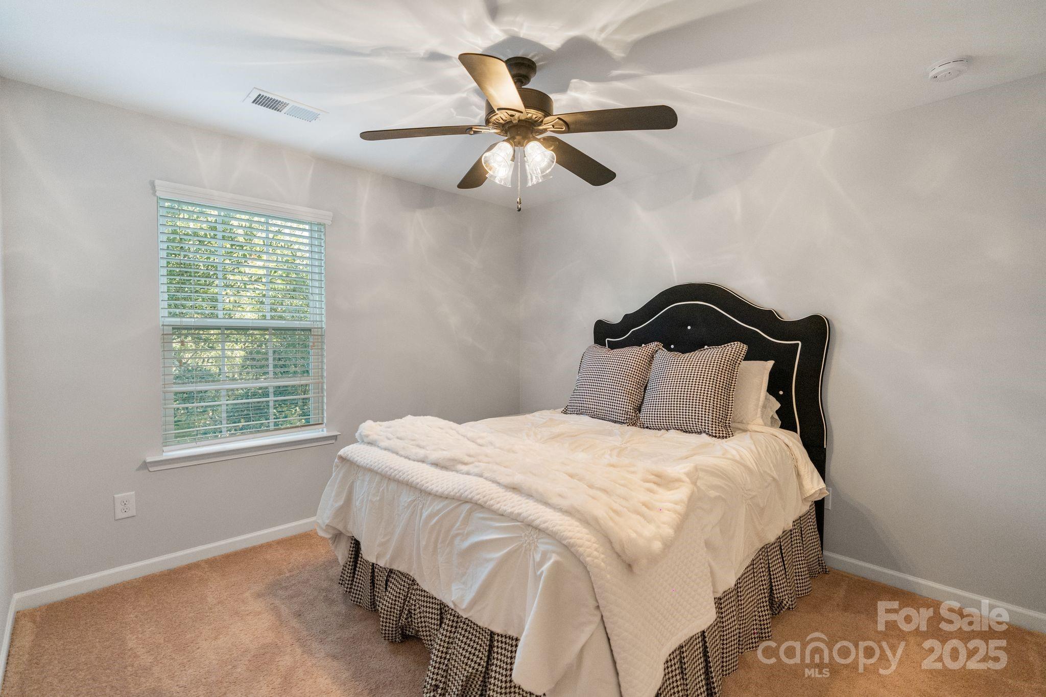 2005 Brightflower Lane York, SC 29745 - Photo 37 of 48 a bedroom with a bed and window