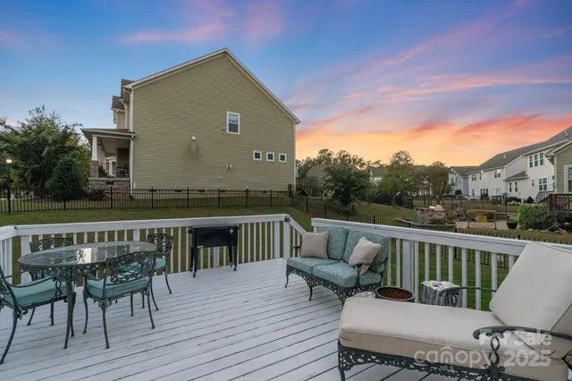 a view of a deck patio and outdoor seating