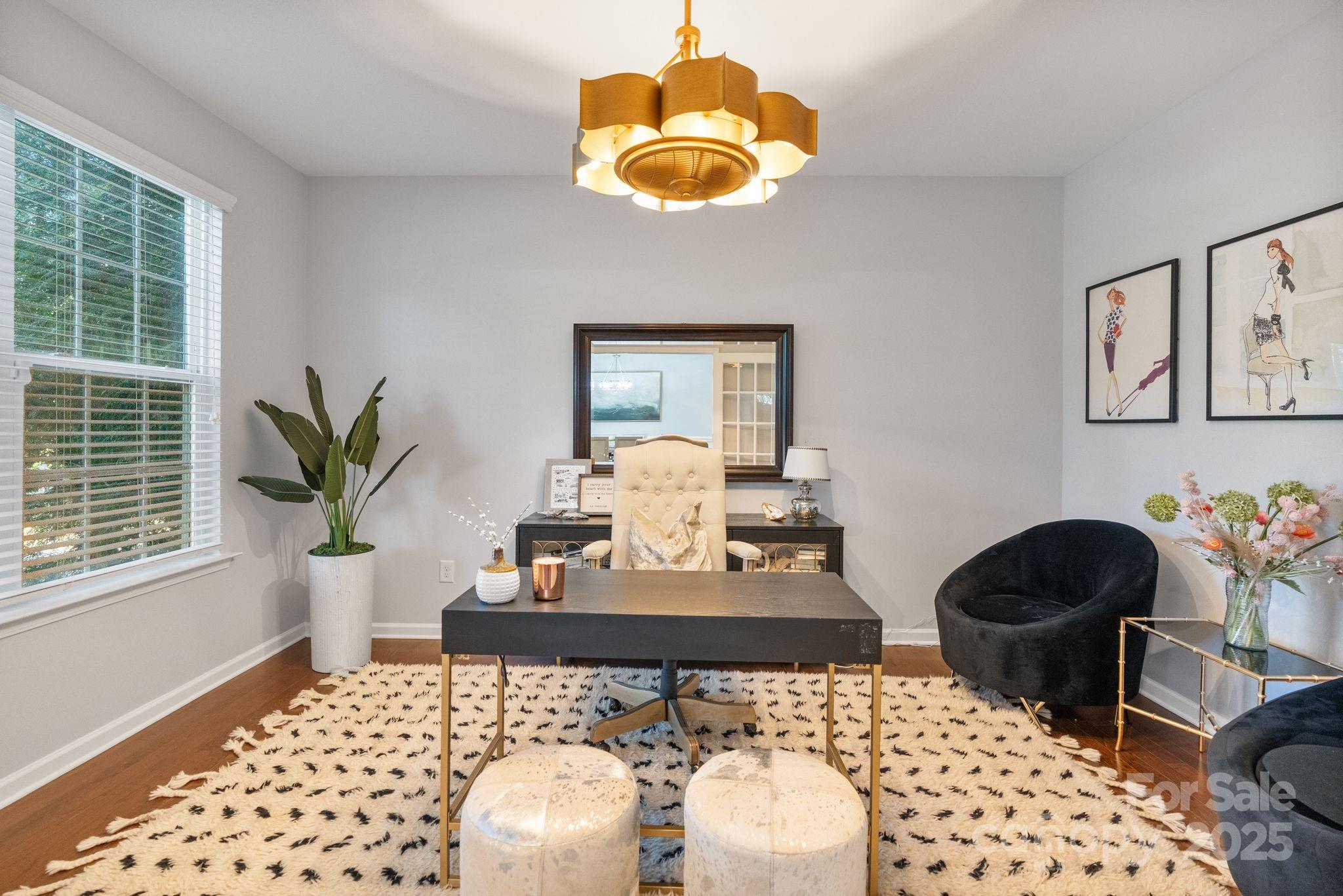 2005 Brightflower Lane York, SC 29745 - Photo 10 of 48 a living room with furniture and a potted plant