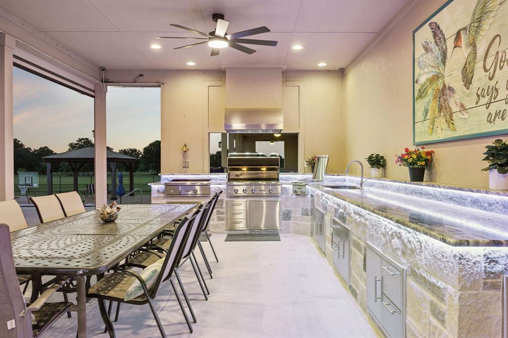 174 King Ranch Court Fort Worth, TX 76108 - Photo 4 of 40 Covered Patio area featuring Built in Grill and an abundance of counter space for entertaining.