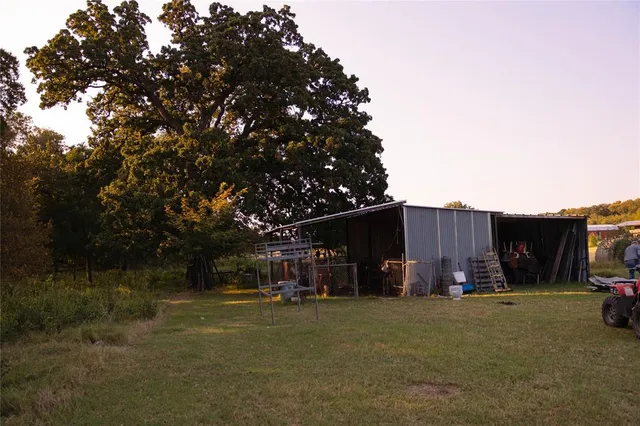 a view of backyard with green space