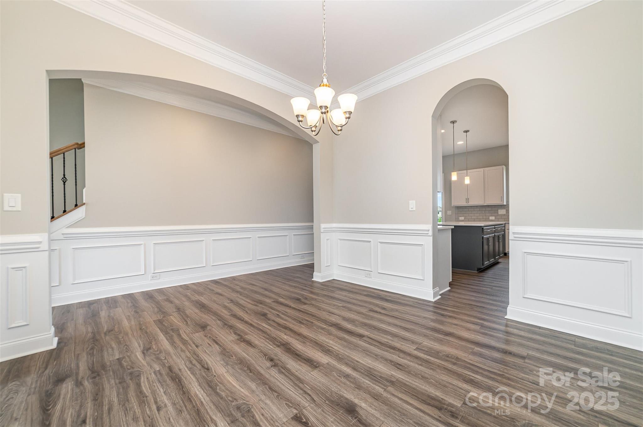 10024 Fox Trotter Lane Midland, NC 28107 - Photo 14 of 43 wooden floor in an empty room with a window