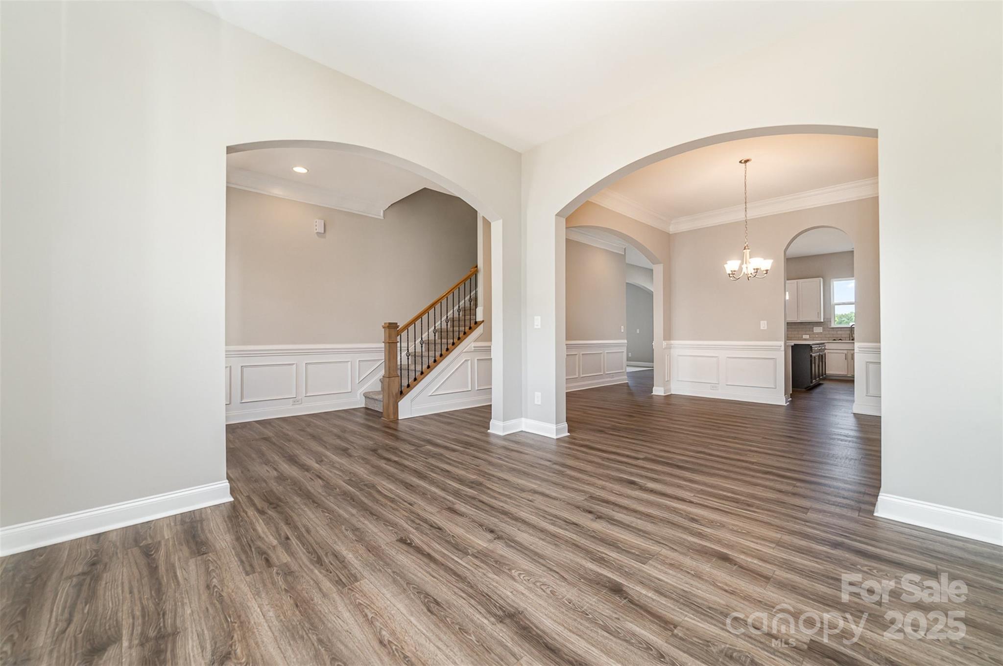 10024 Fox Trotter Lane Midland, NC 28107 - Photo 9 of 43 a view of empty room with wooden floor