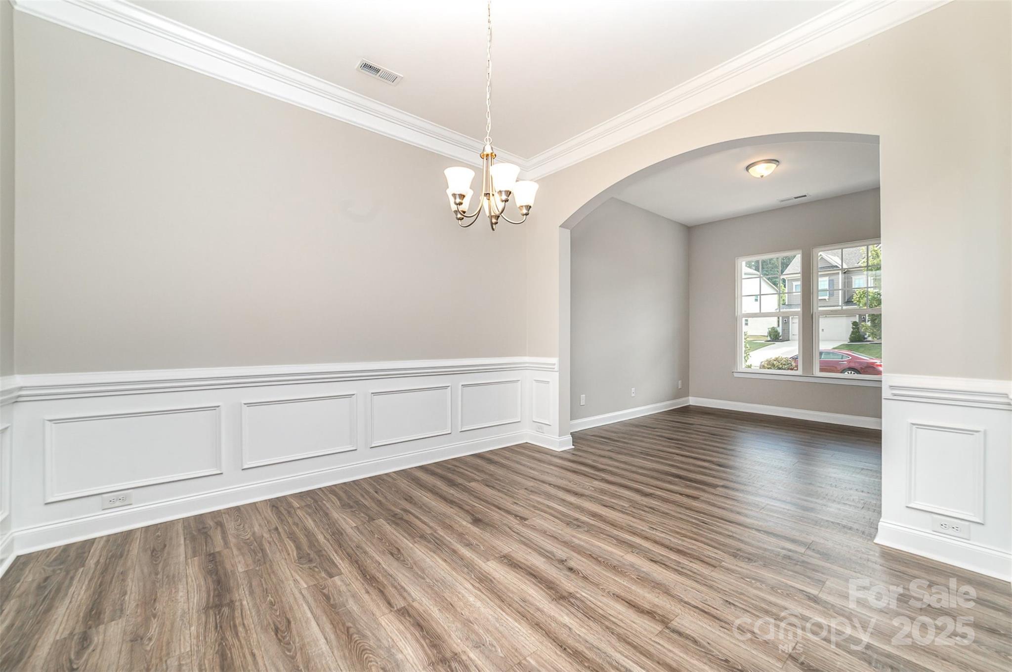 10024 Fox Trotter Lane Midland, NC 28107 - Photo 10 of 43 a view of a room with wooden floor and window