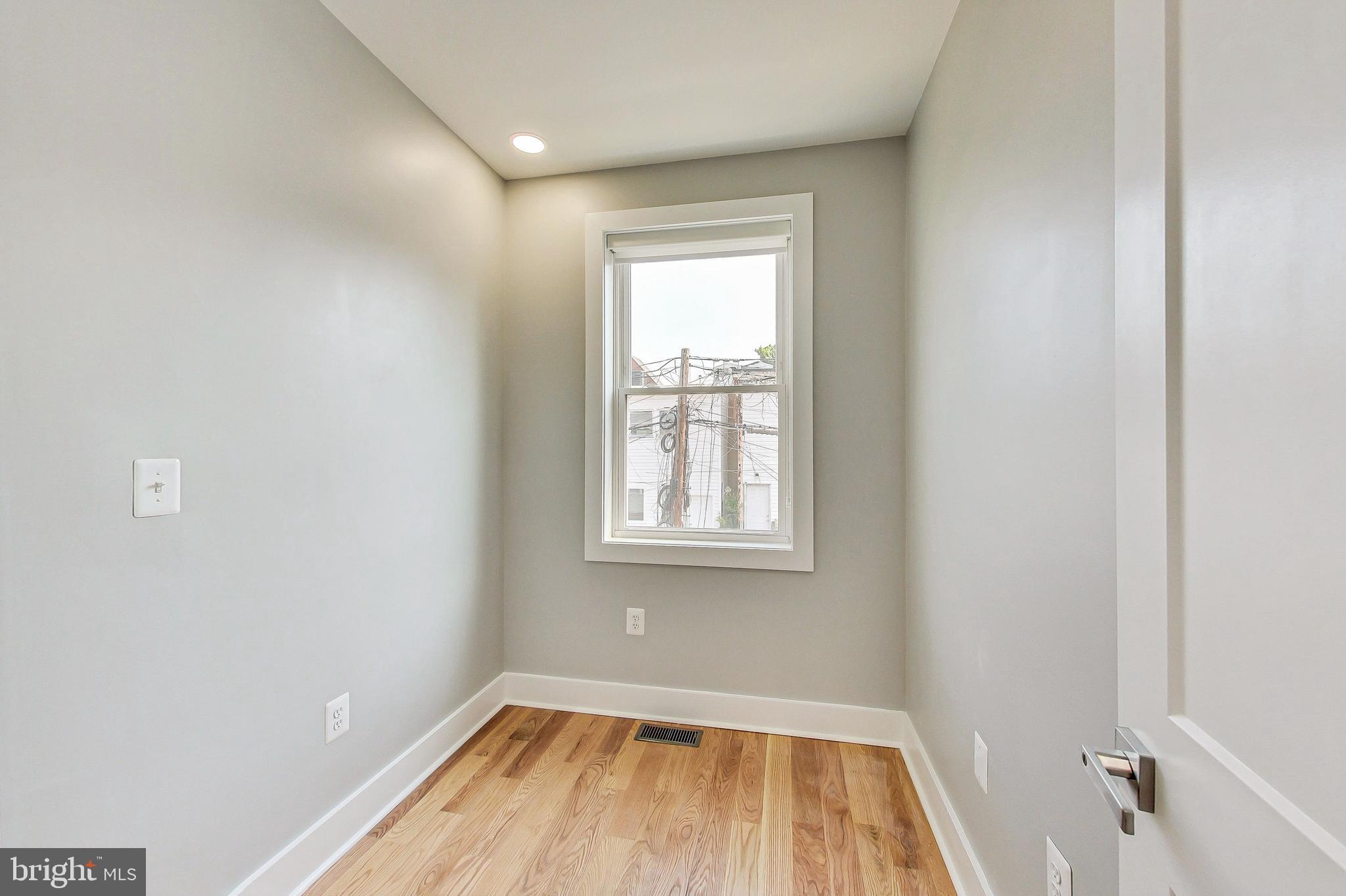 1124 Owen Place Northeast Washington, DC 20002 - Photo 11 of 19 a view of a room that has a window in it