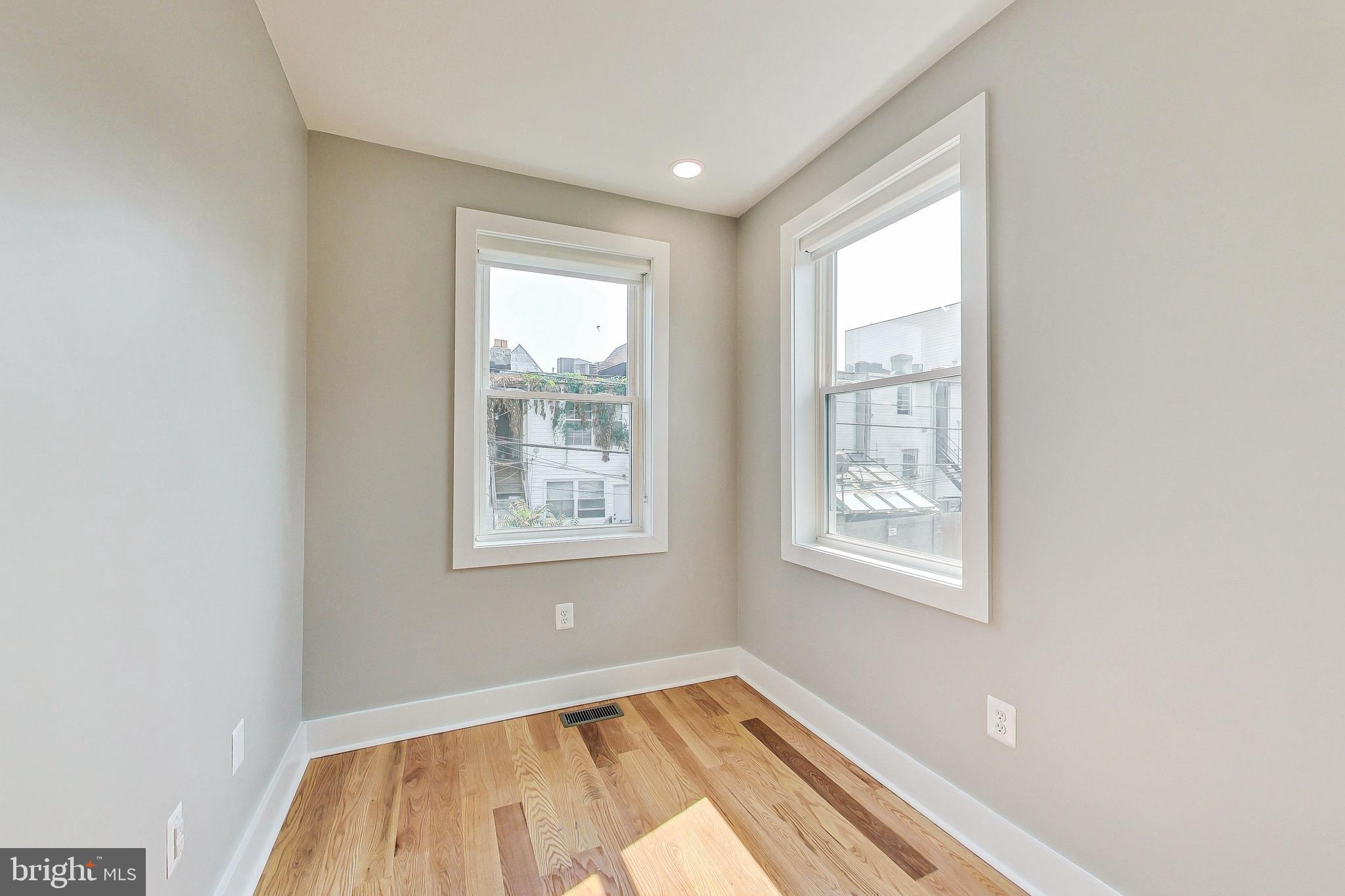 1124 Owen Place Northeast Washington, DC 20002 - Photo 10 of 19 an empty room with a window