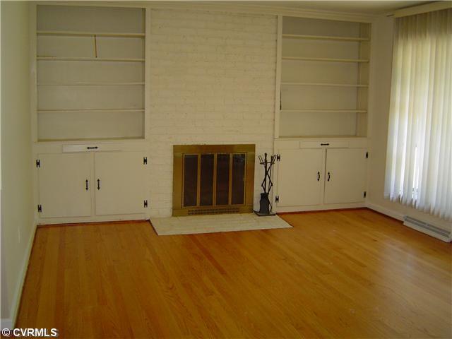 7527 Donder Road Henrico, VA 23294 - Photo 3 of 12 Living Room - Newly refinished floors, spacious living room with beautiful bow window and fireplace