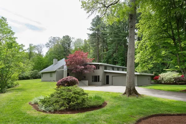a house view with a garden space