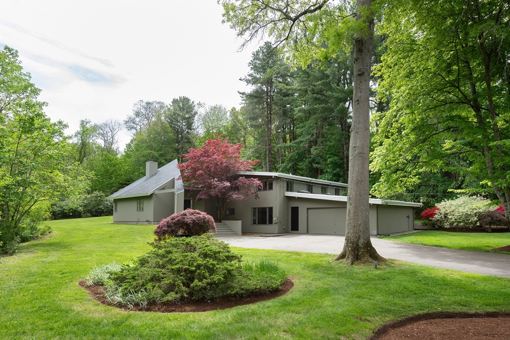 7 Diamond Road Lexington, MA 02420 - Photo 1 of 42 a house view with a garden space