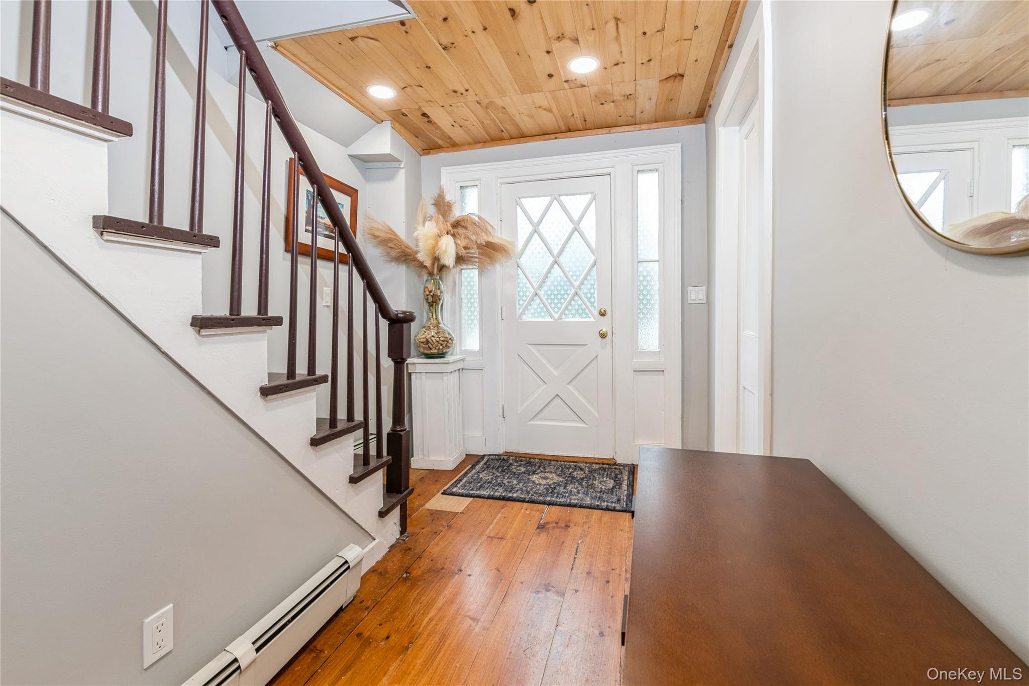 35950 Main Road Cutchogue, NY 11935 - Photo 14 of 39 a view of entryway with wooden floor