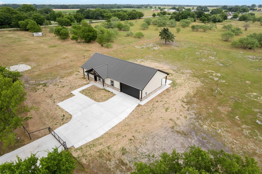 121 Brazier Road Ennis, TX 75119 - Photo 24 of 31 a view of a lake with a mountain