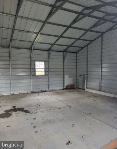 a view of a room with an empty space