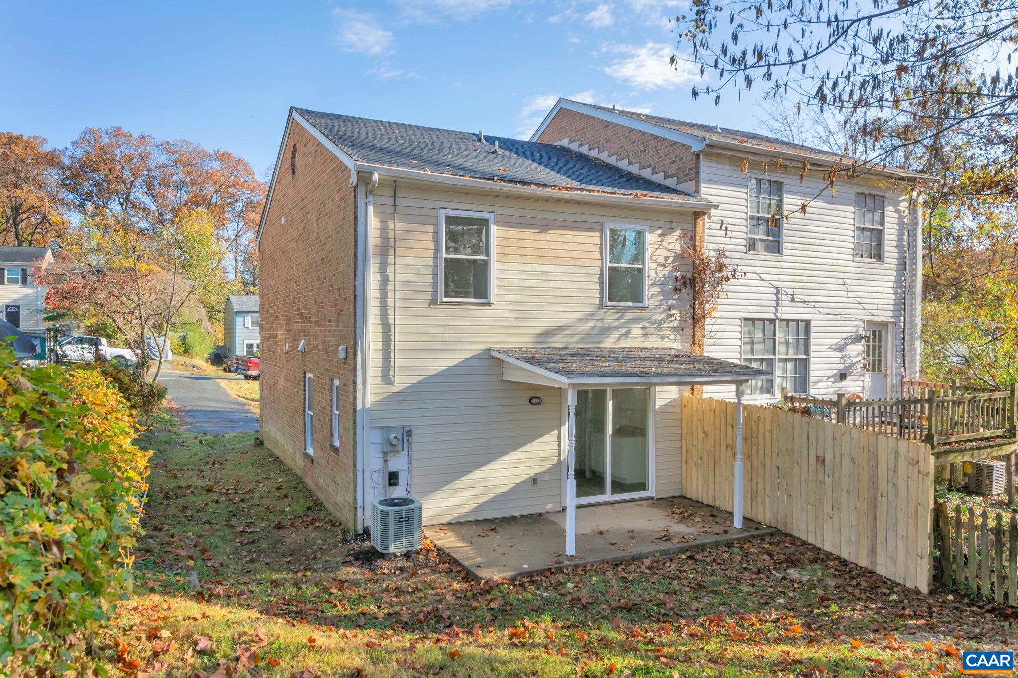 606 Bailey Road Charlottesville, VA 22903 - Photo 6 of 29 a front view of a house with a yard