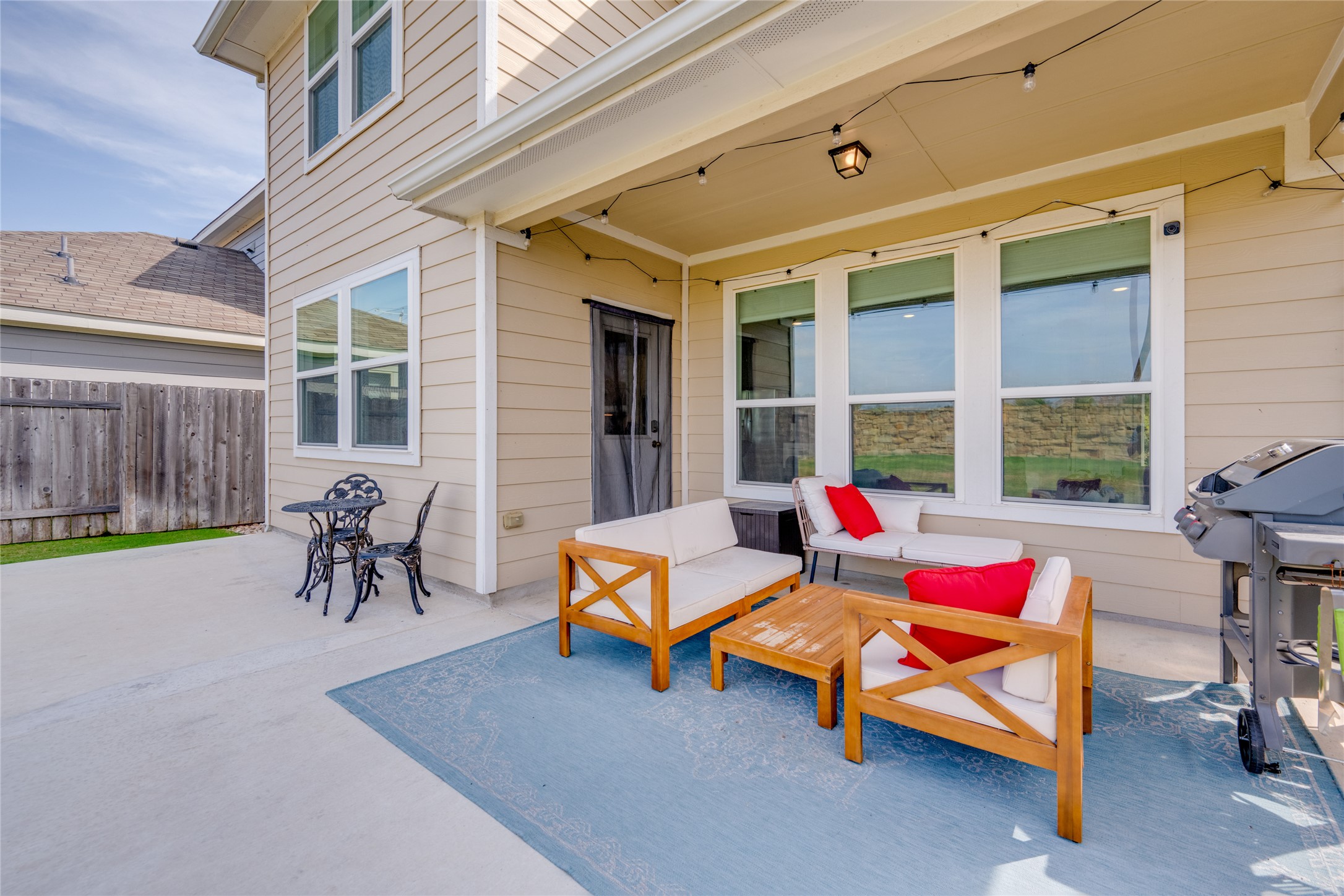 7948 Castelardo Place Round Rock, TX 78665 - Photo 2 of 32 a living room with patio furniture and a window