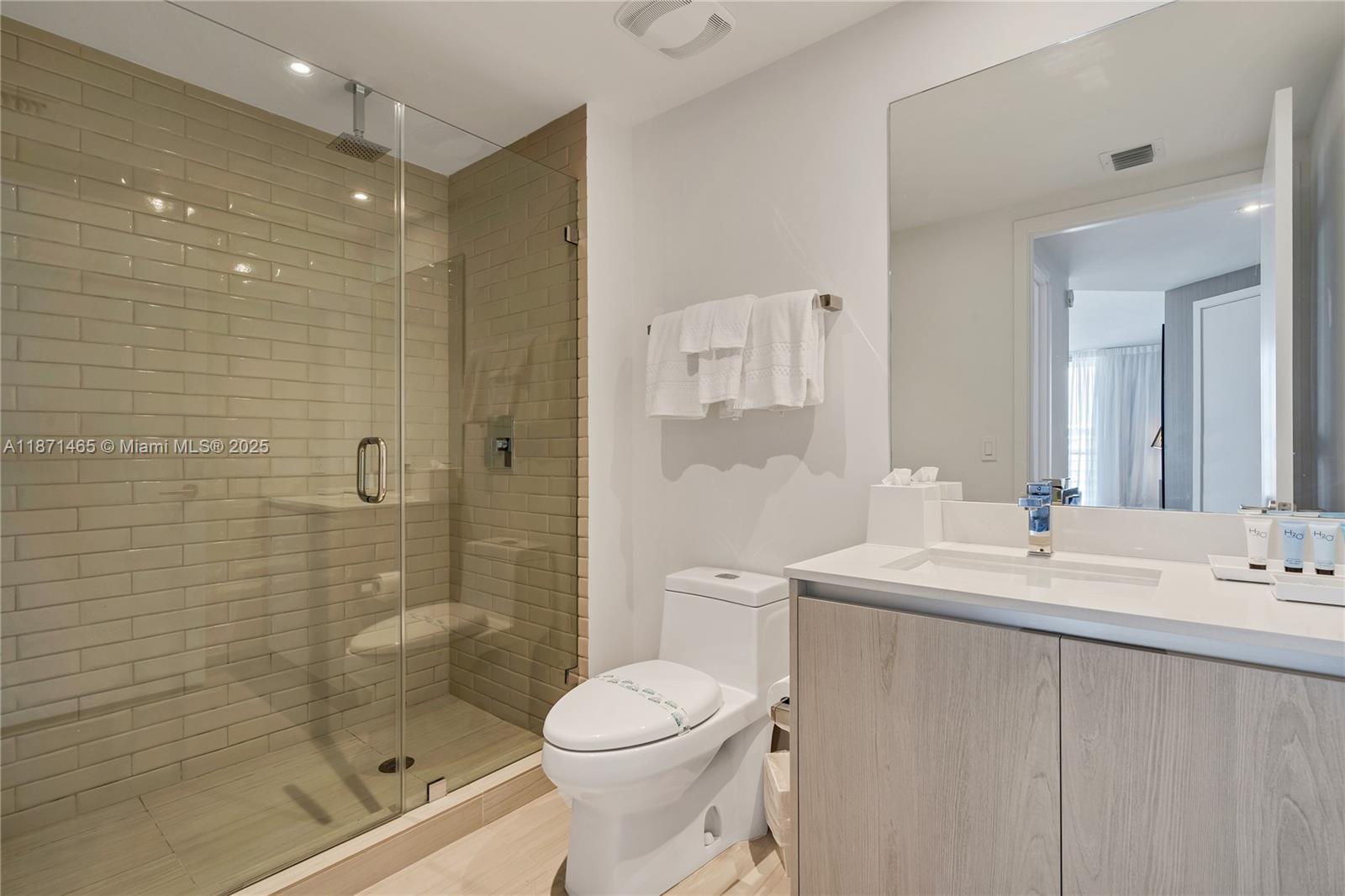 4010 South Ocean Drive, Unit R2301 Hollywood, FL 33019 - Photo 14 of 33 a bathroom with a sink toilet and shower