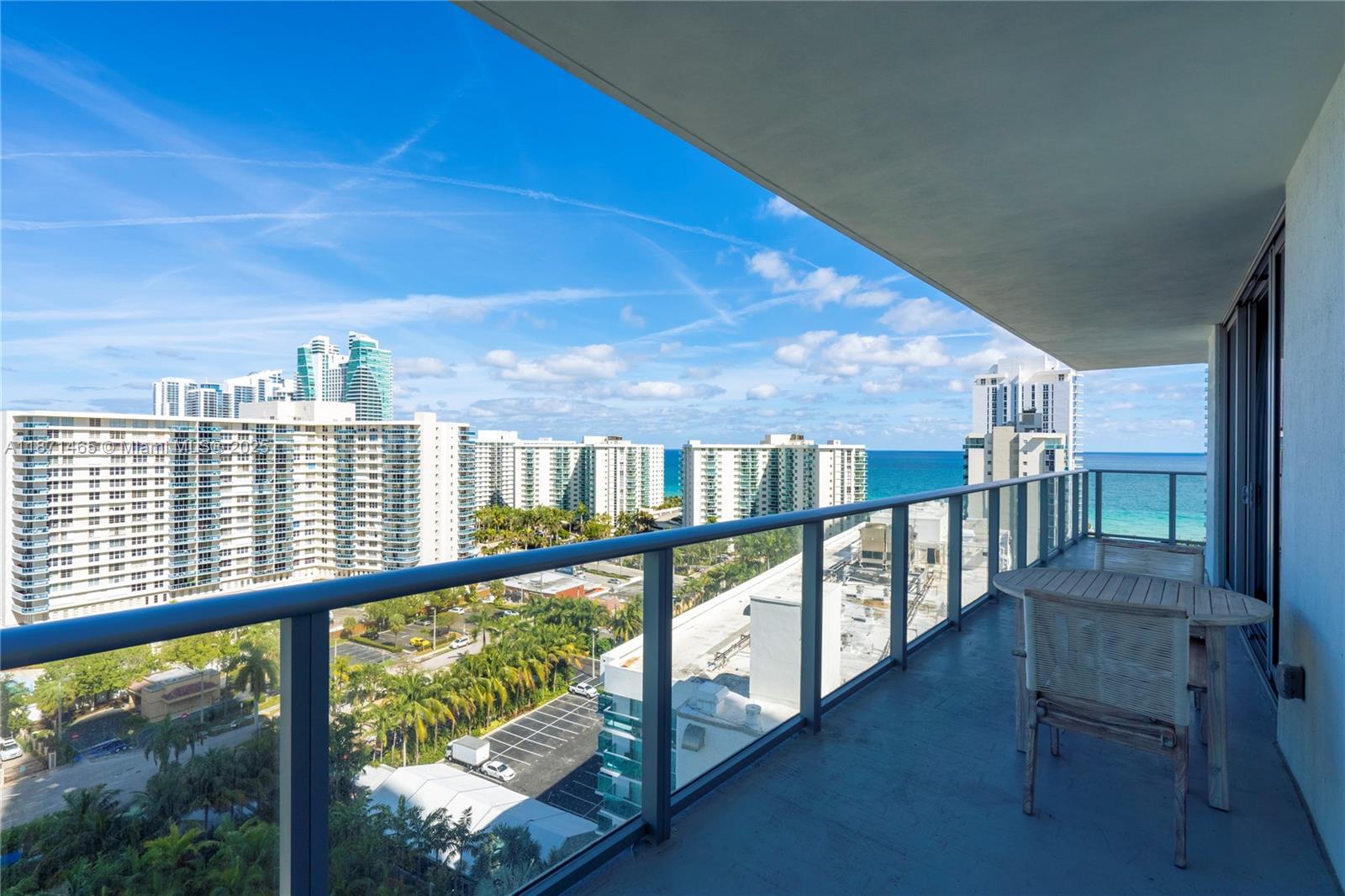 4010 South Ocean Drive, Unit R2301 Hollywood, FL 33019 - Photo 20 of 33 a view of a balcony with chairs
