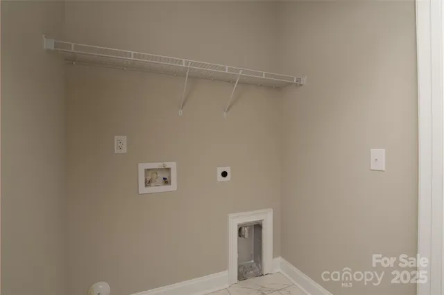 a view of a chairs and table in the balcony