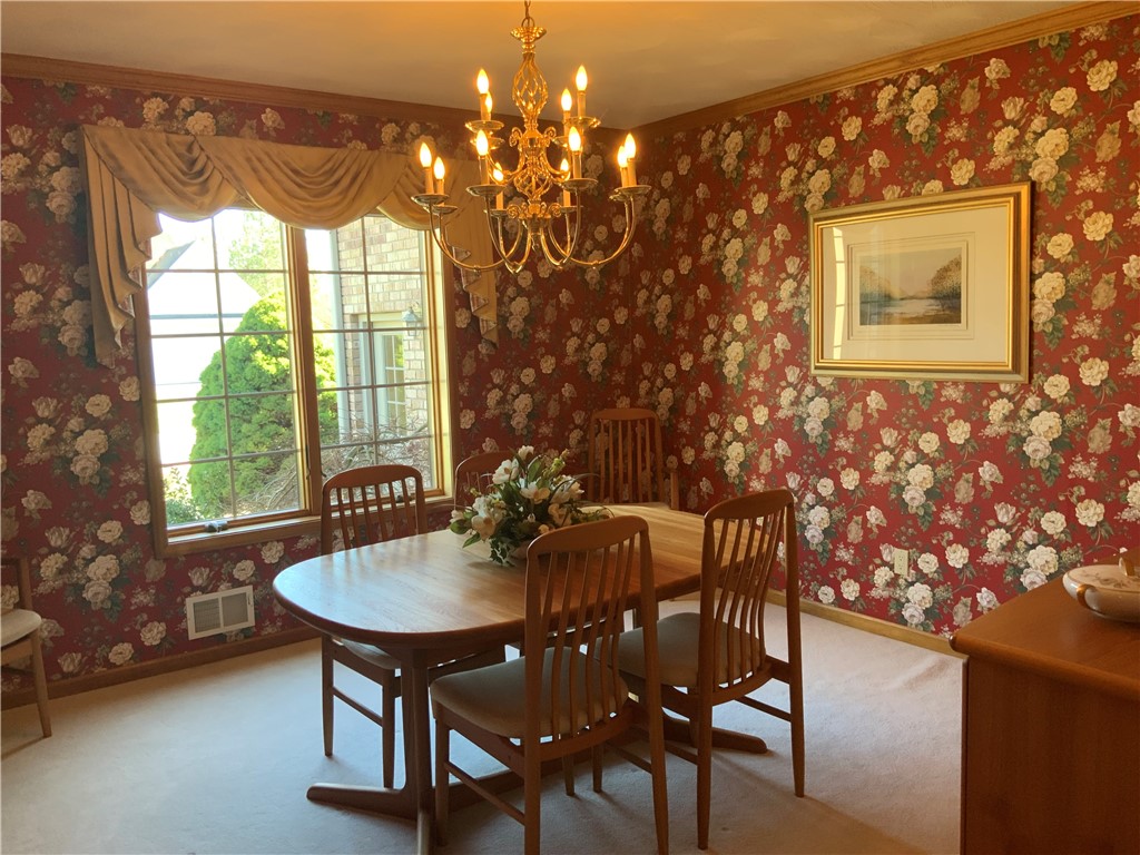 3 Glen Eagle Way Perinton, NY 14450 - Photo 15 of 43 Dining room looking to front yard
