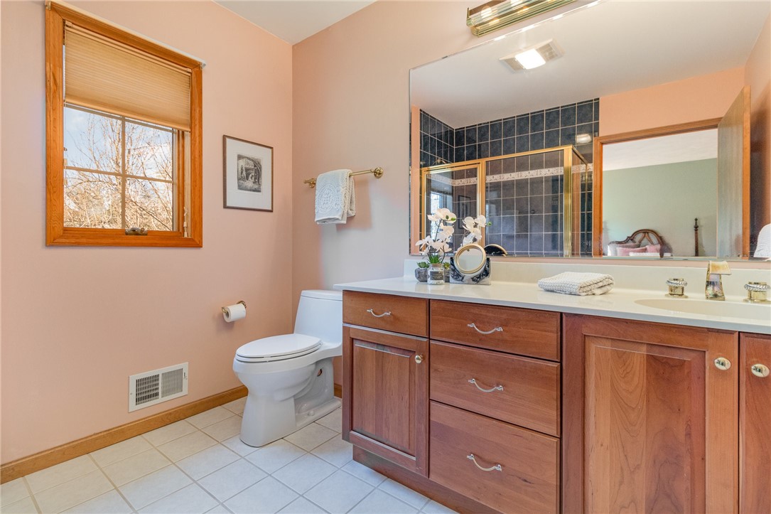 3 Glen Eagle Way Perinton, NY 14450 - Photo 26 of 43 Primary bedroom Bath with oversize shower