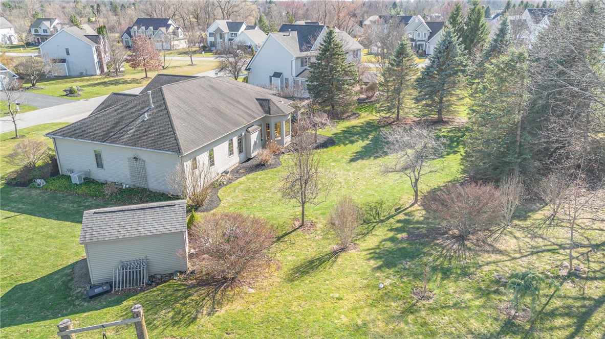 3 Glen Eagle Way Perinton, NY 14450 - Photo 38 of 43 Aerial view of landscaped backyard