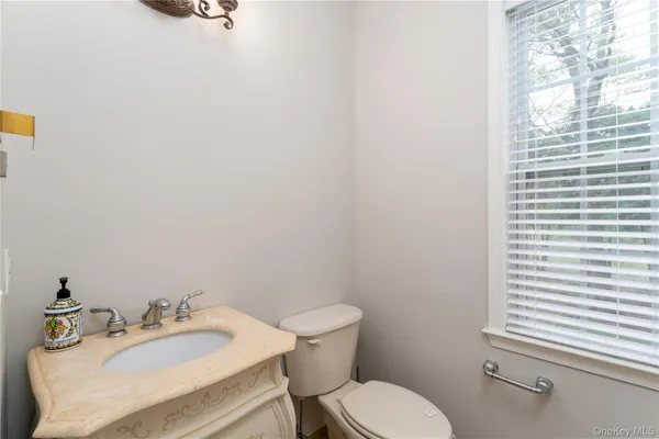 a bathroom with a sink and a toilet