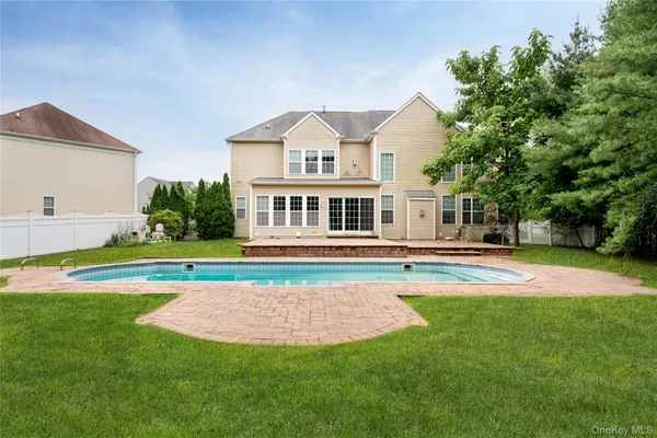 a view of a house with a swimming pool