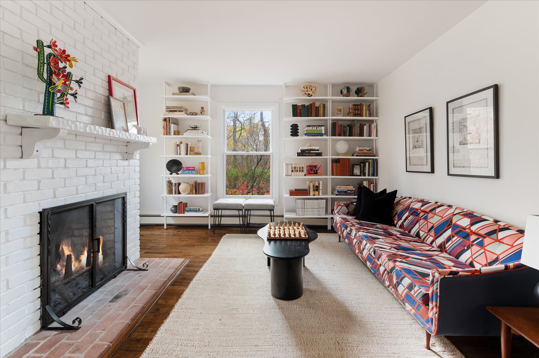 115 Mayapple Road Stamford, CT 06903 - Photo 13 of 38 a living room with furniture and a fireplace
