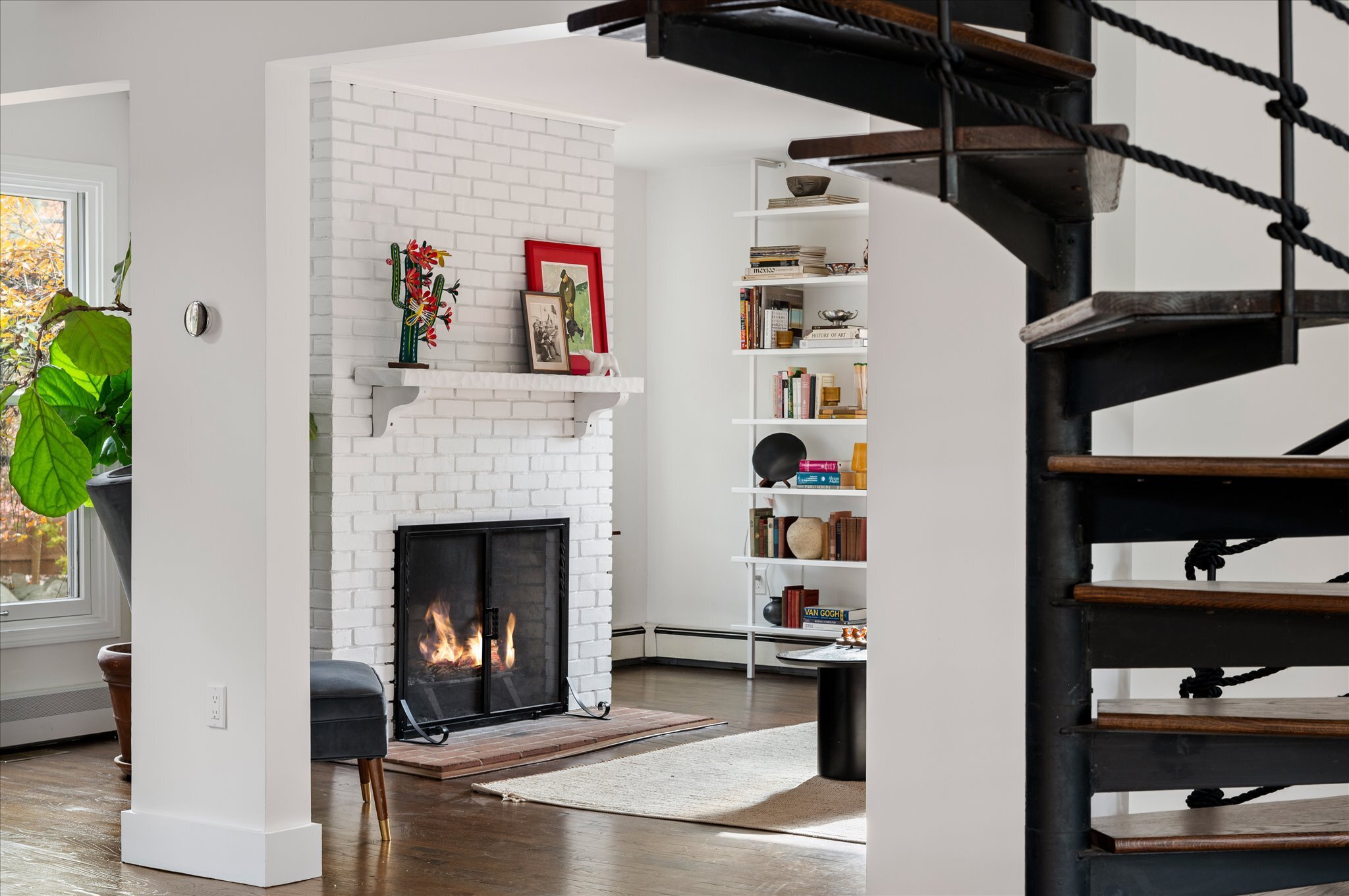115 Mayapple Road Stamford, CT 06903 - Photo 14 of 38 a living room with furniture and a fireplace