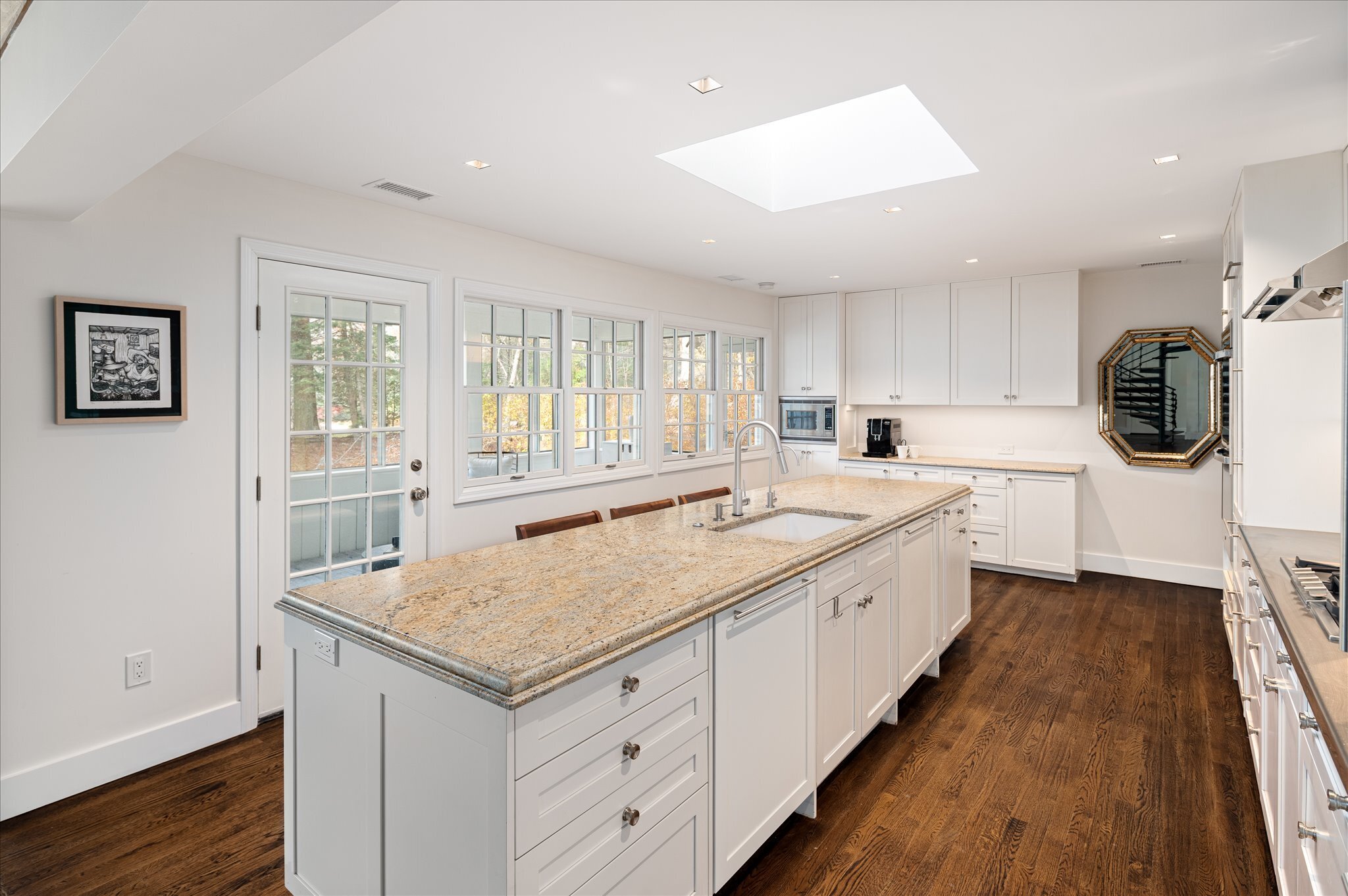 115 Mayapple Road Stamford, CT 06903 - Photo 15 of 38 a kitchen with a stove a sink and a refrigerator