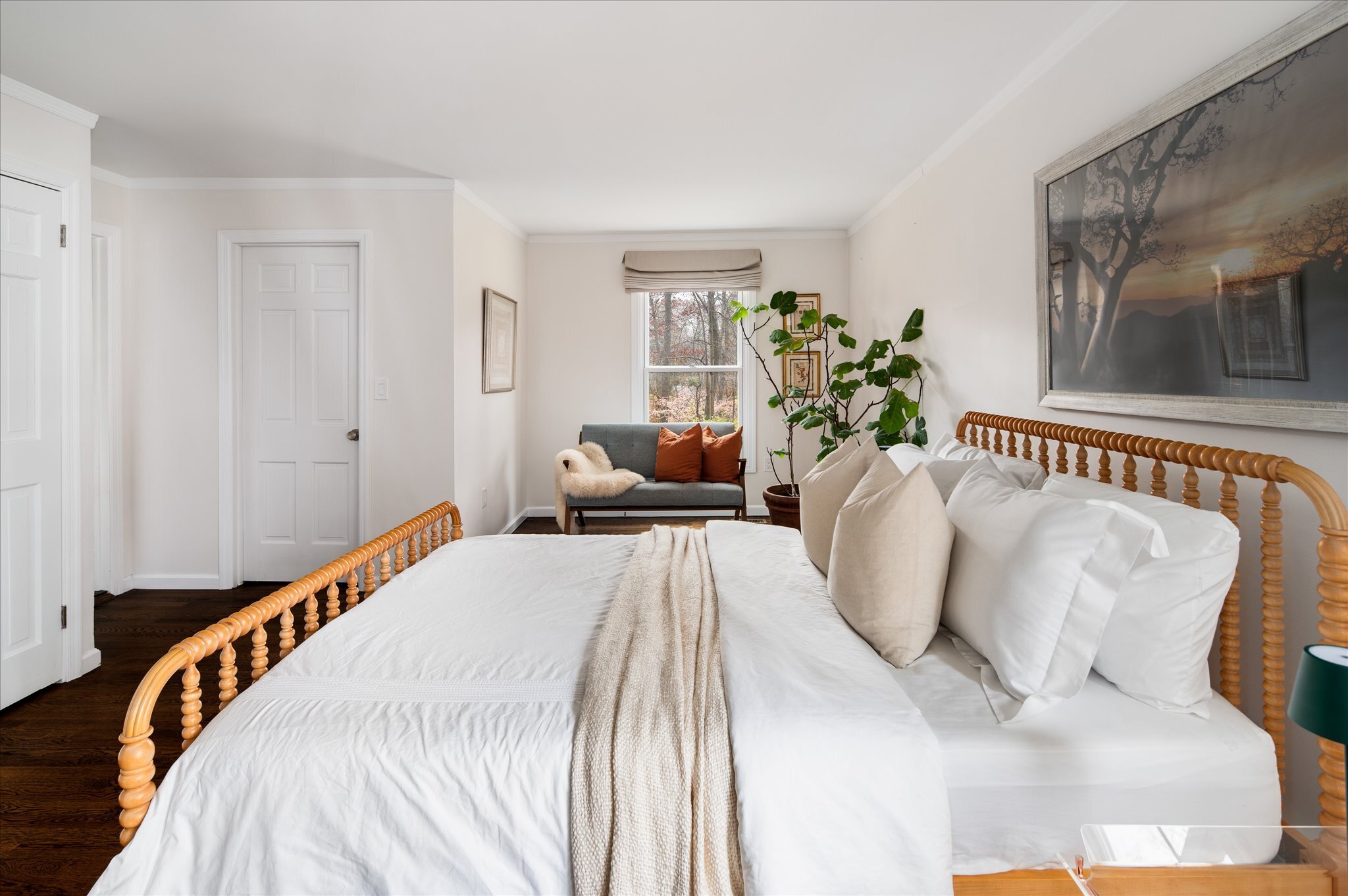 115 Mayapple Road Stamford, CT 06903 - Photo 24 of 38 a bedroom with a large bed and a potted plant