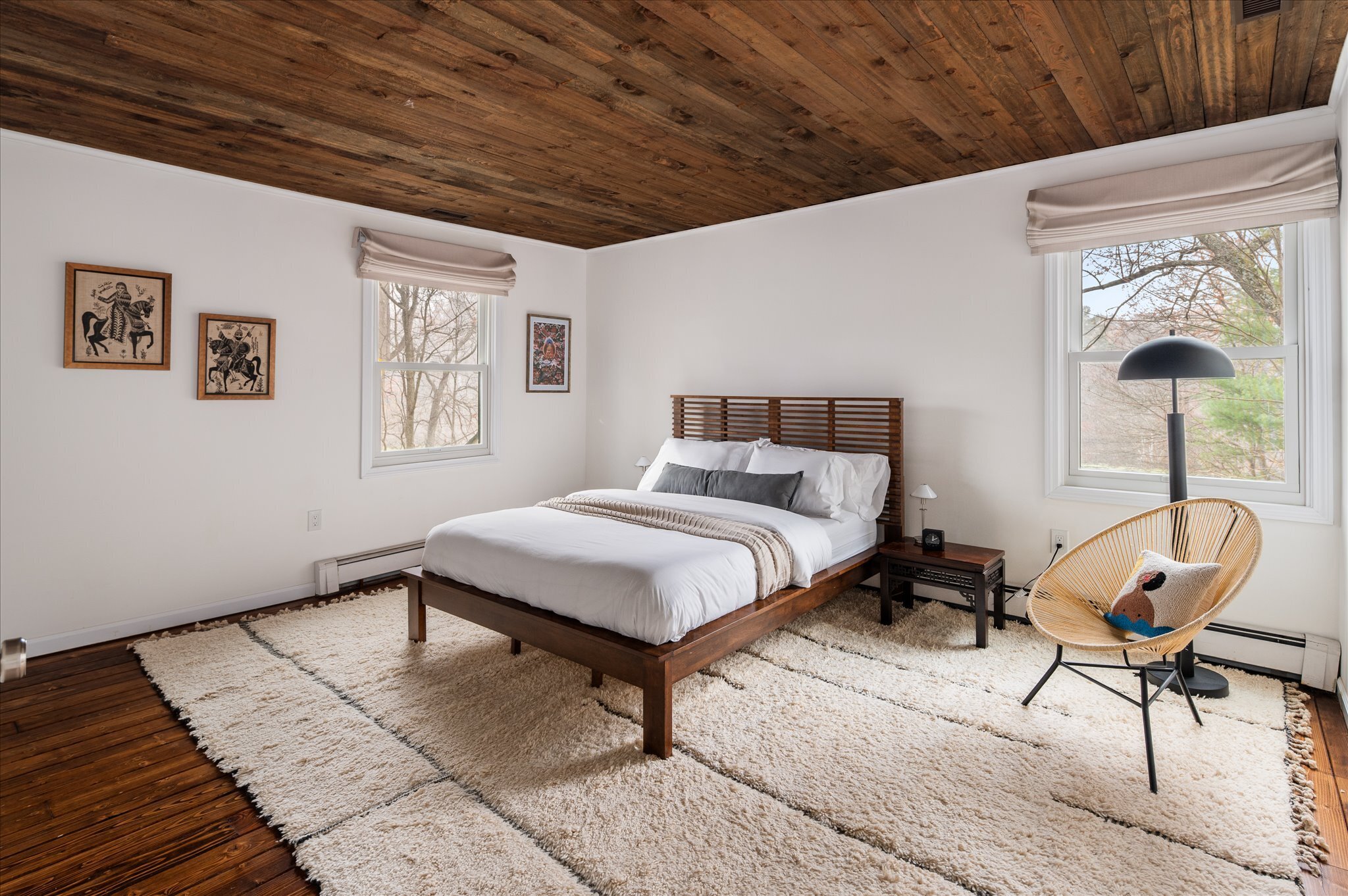 115 Mayapple Road Stamford, CT 06903 - Photo 28 of 38 a bedroom with a bed a chair and potted plant