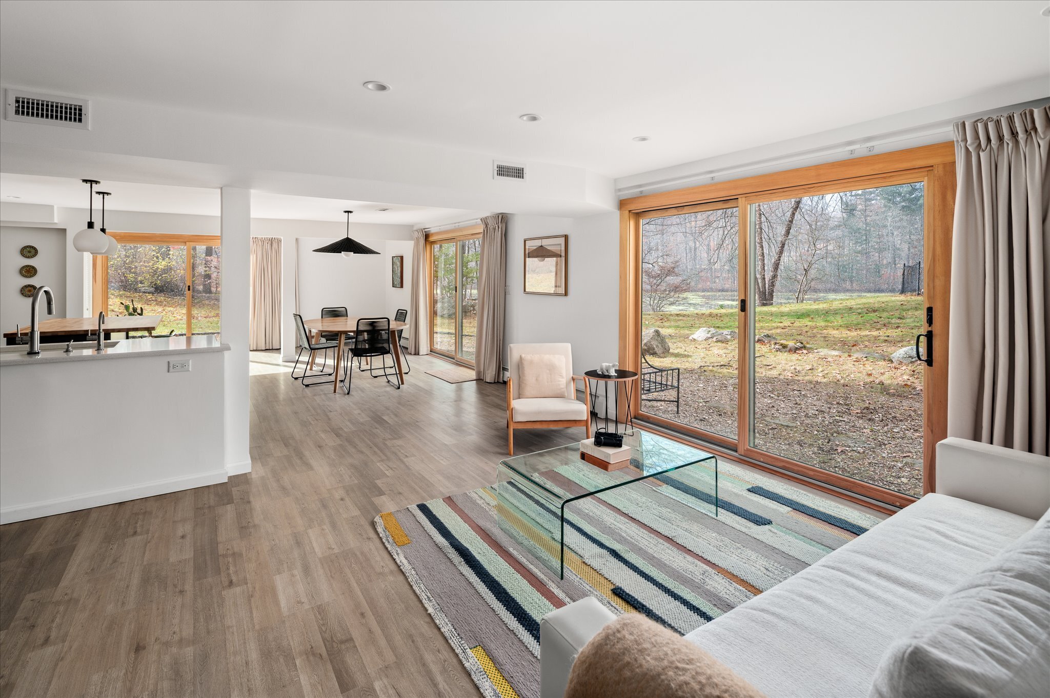 115 Mayapple Road Stamford, CT 06903 - Photo 31 of 38 a living room with furniture and a table