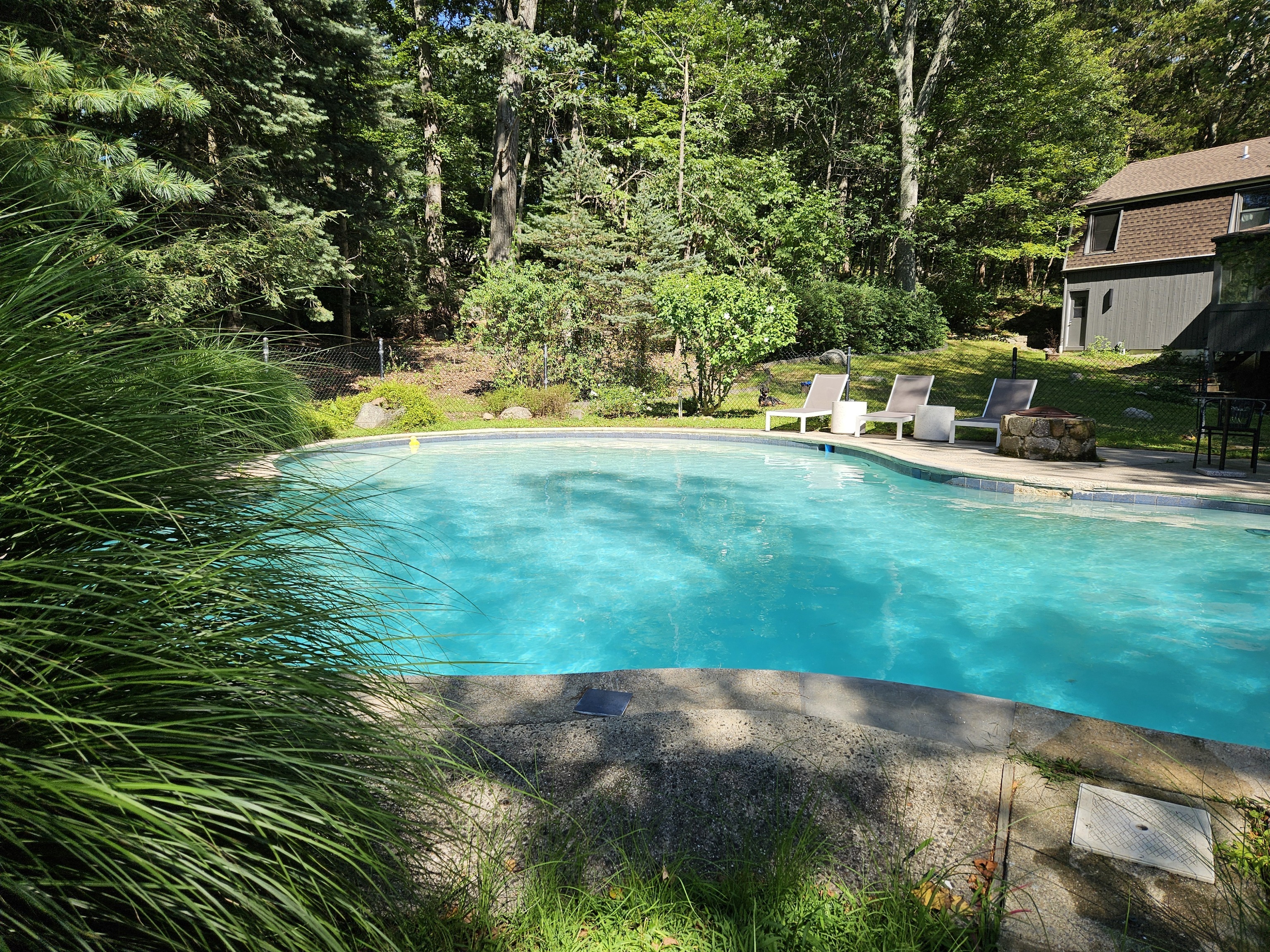 115 Mayapple Road Stamford, CT 06903 - Photo 33 of 38 a view of a house with a yard