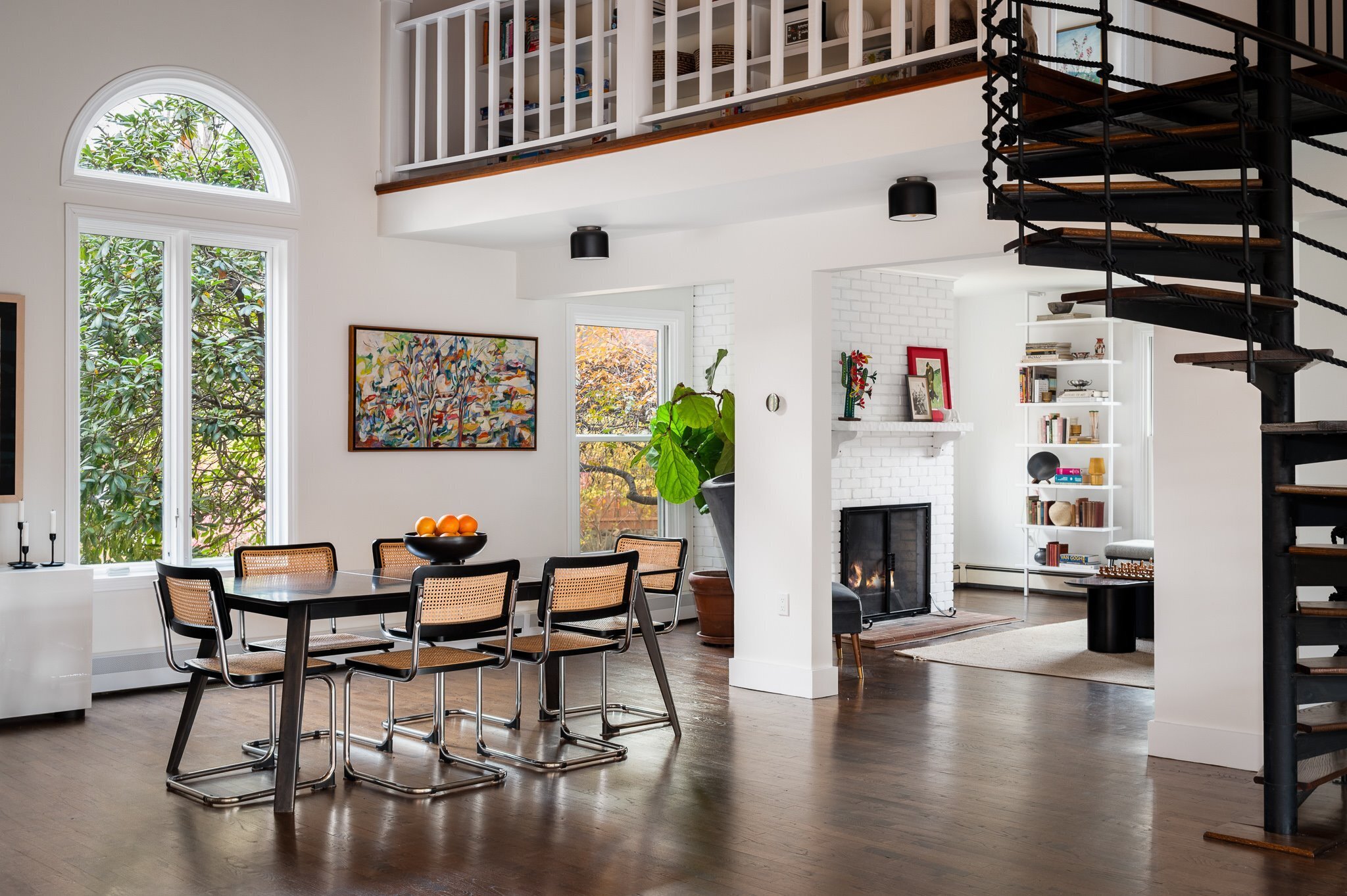 115 Mayapple Road Stamford, CT 06903 - Photo 8 of 38 a living room with furniture a fireplace and a large window