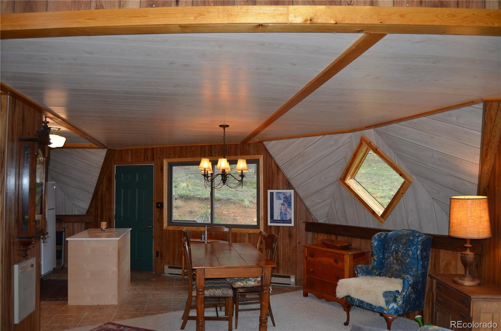195 Baker Road Bailey, CO 80421 - Photo 11 of 24 a view of a livingroom with furniture and window