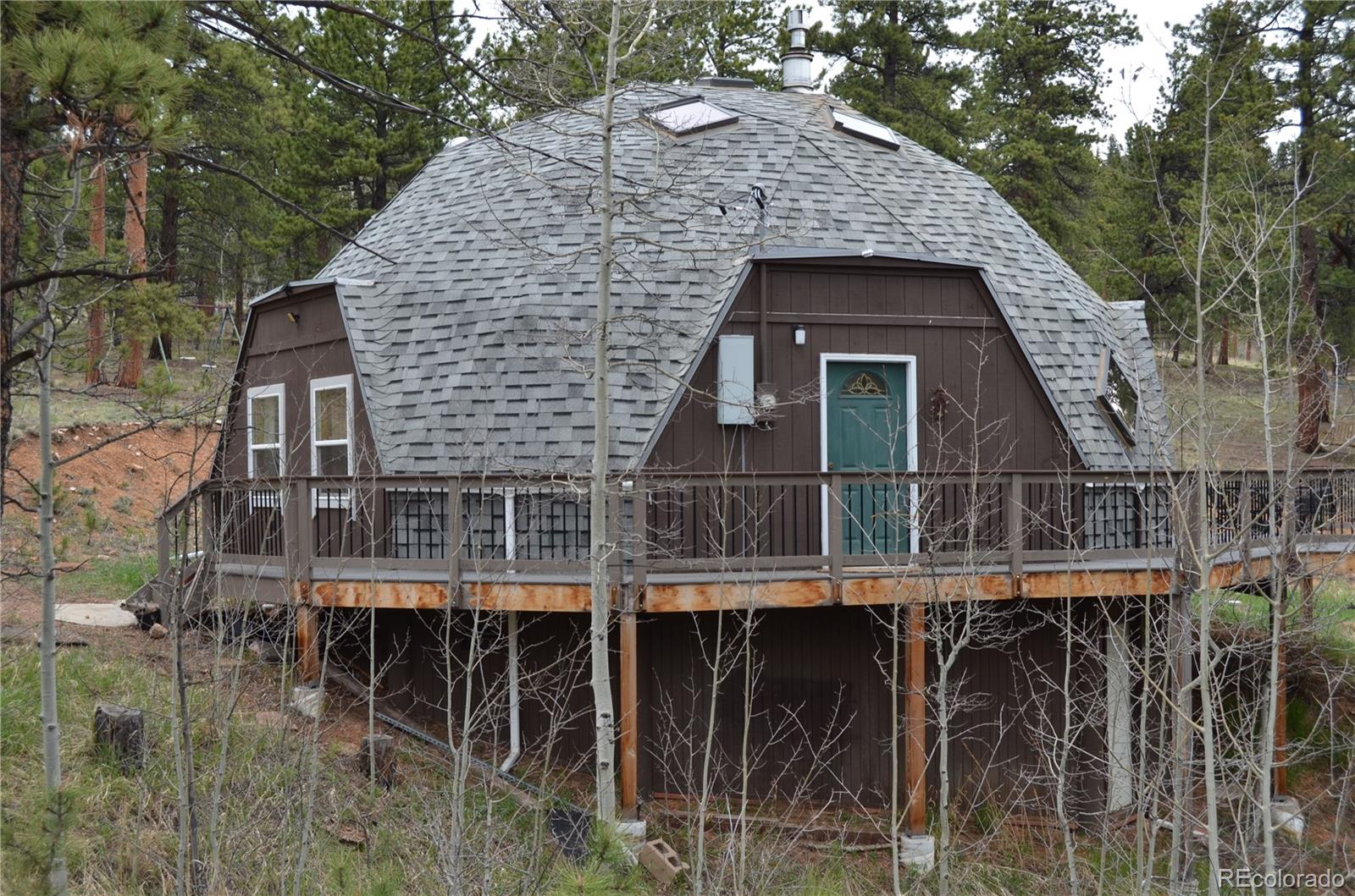 195 Baker Road Bailey, CO 80421 - Photo 5 of 24 a aerial view of a house with a balcony