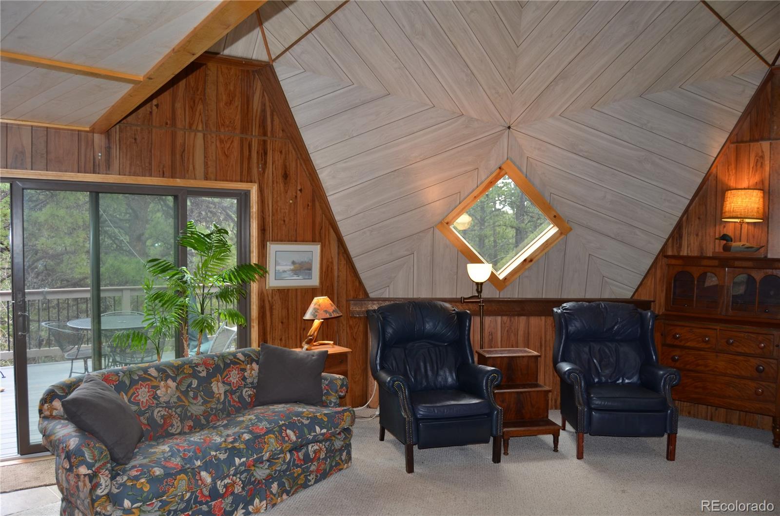 195 Baker Road Bailey, CO 80421 - Photo 6 of 24 a living room with furniture and a window