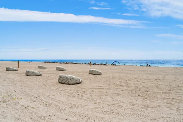 a view of a lake with a building in the background